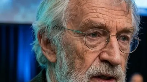 Still from The Sea Candle: close-up of a scientist at the Reykjavik summit
